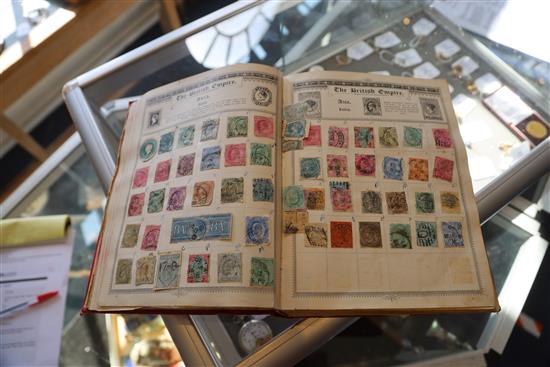 The Empire Postage Stamp Album and a quantity of First Day Covers